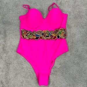 Peach-pink one-piece swimsuit with elegant waist embroidery.Size XL